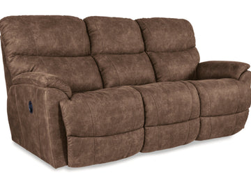 Brown reclining sofa on a white background