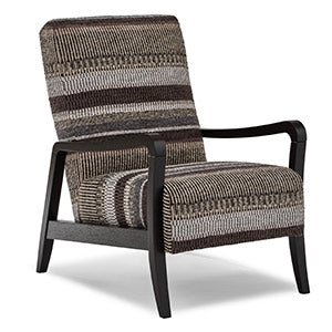 Patterned armchair with wooden frame on a white background