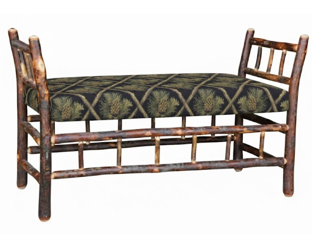 Wooden bench with a patterned cushion on a white background