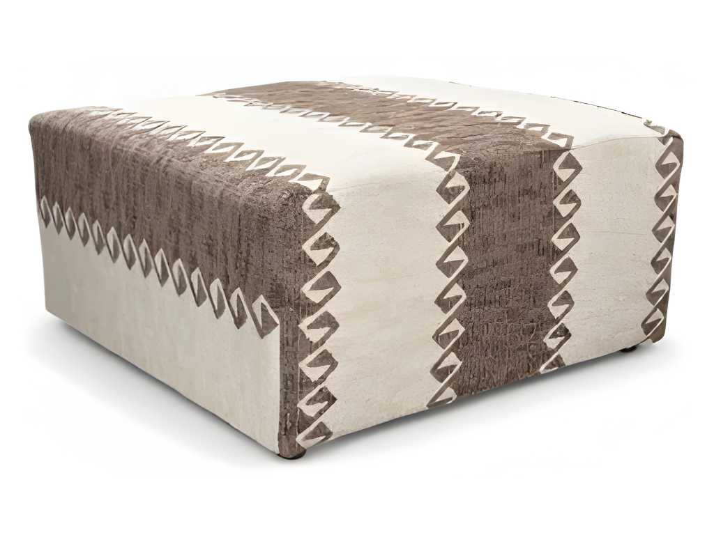 Patterned ottoman with brown and beige design on a white background