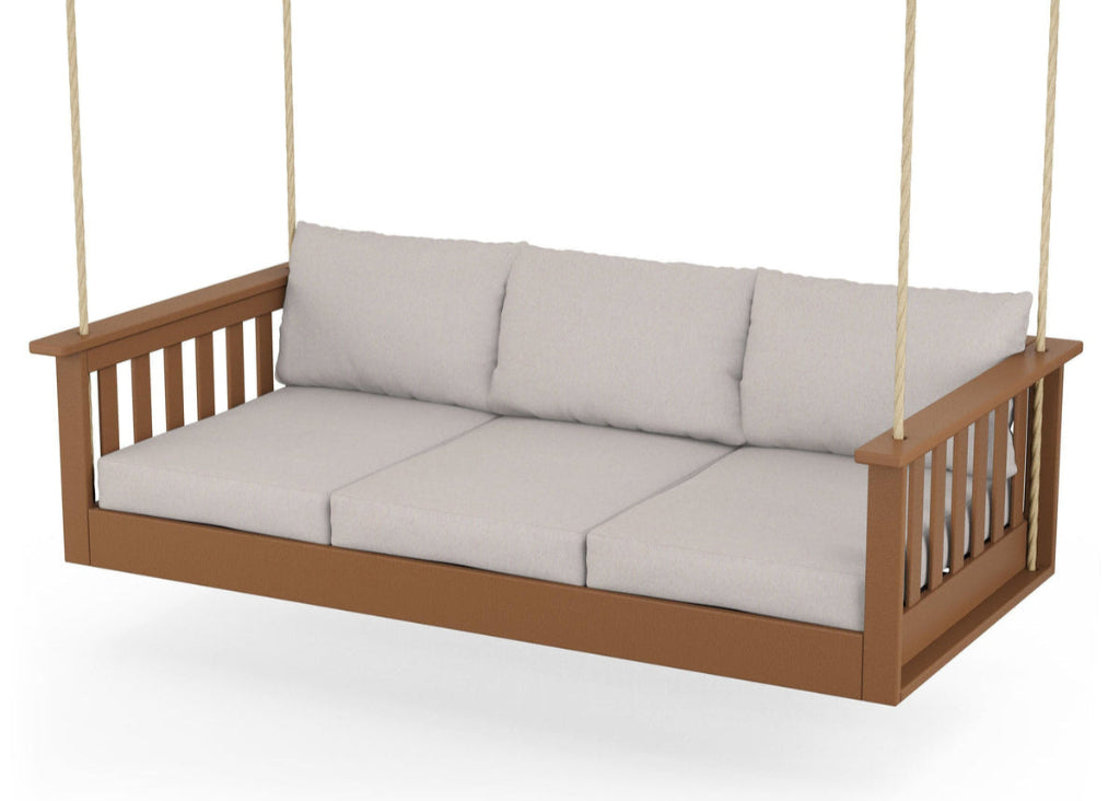 Wooden swing with gray cushions on a white background